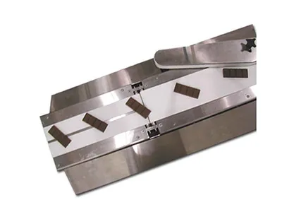 Tray Loading Rocker Automatic Tray Loader & Bar Tray Loading Equipment Solutions | Benchmark